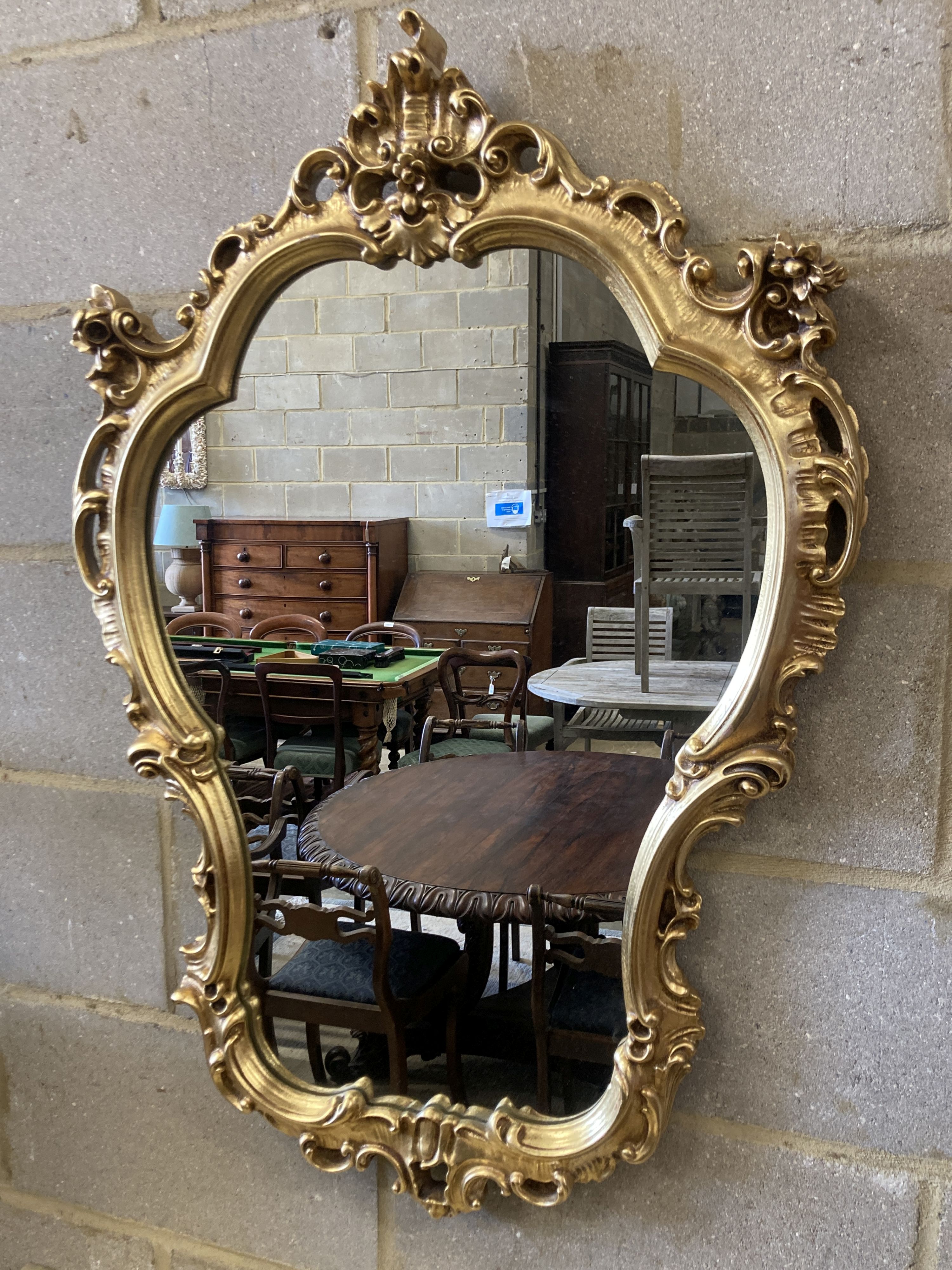 An 18th century style onyx topped gilt console table, width 94cm, depth 29cm, height 87cm with mirror